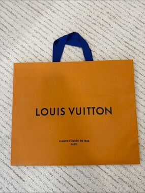 Louis Vuitton Orange Shopping Bag with Blue Handles and Black Logo